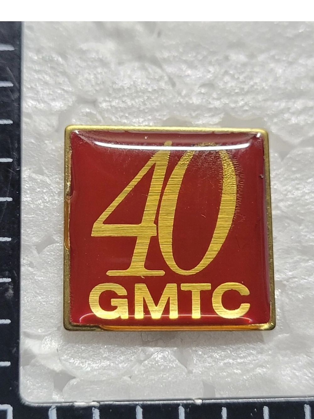 40th Anniversary Red and Gold Commemorative Pin For GMTC